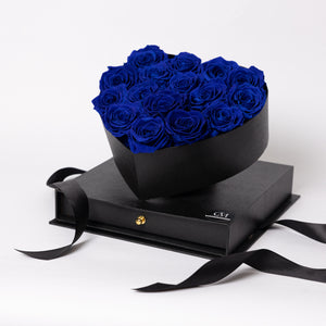 Black Heart Box. Blue Preserved Roses
